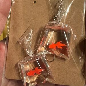So cute dangling goldfish in a‎ bag -